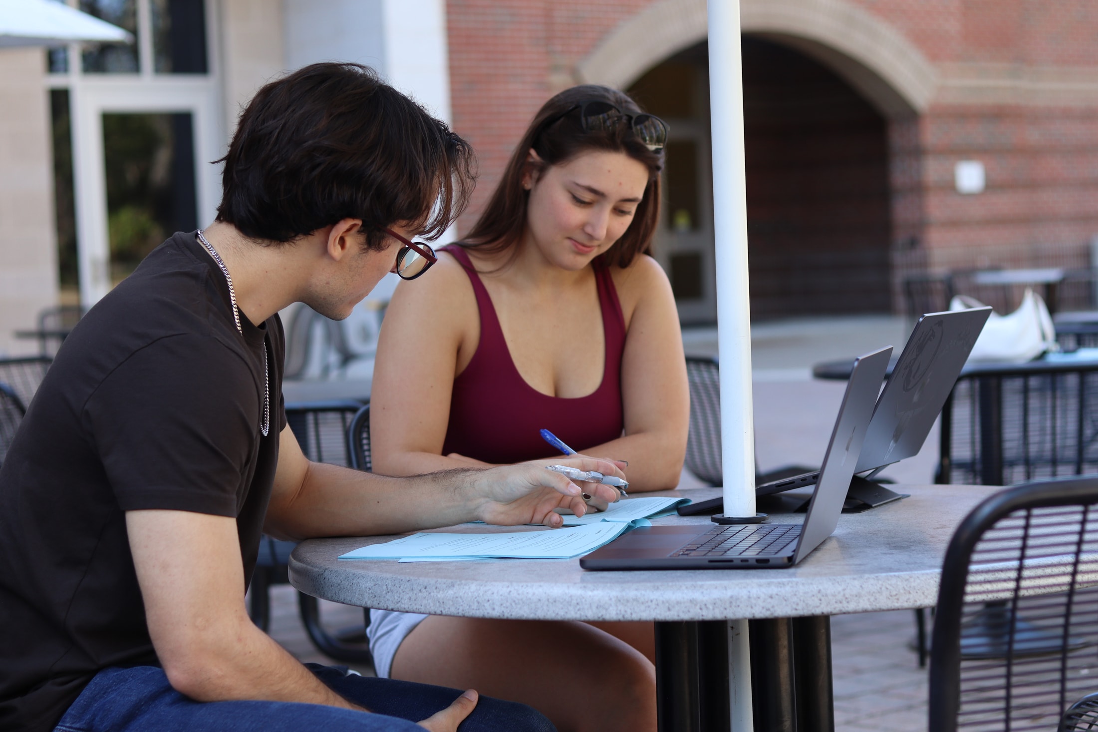 UCF students studying together with an Accuity packet